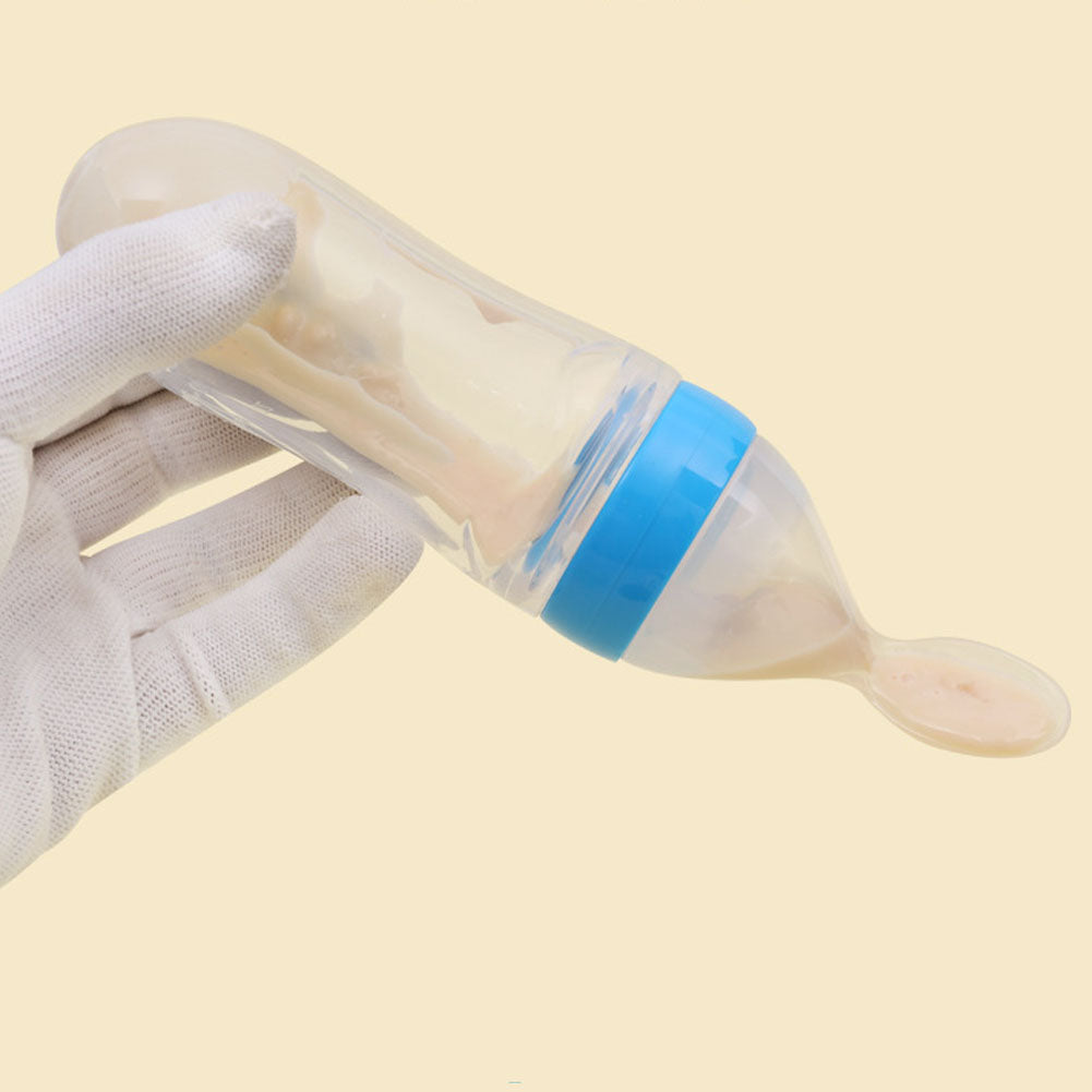 feeding spoon with a bottle